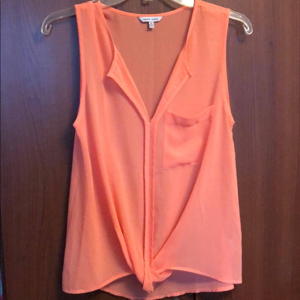 Peach colored top, sleeveless